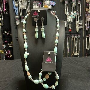 A very classy necklace earring and bracelet set with the look of natural stone